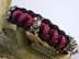 Bild von Paracord Armband BUNNY - schwarz / neon pink diamond mit Metall Hase